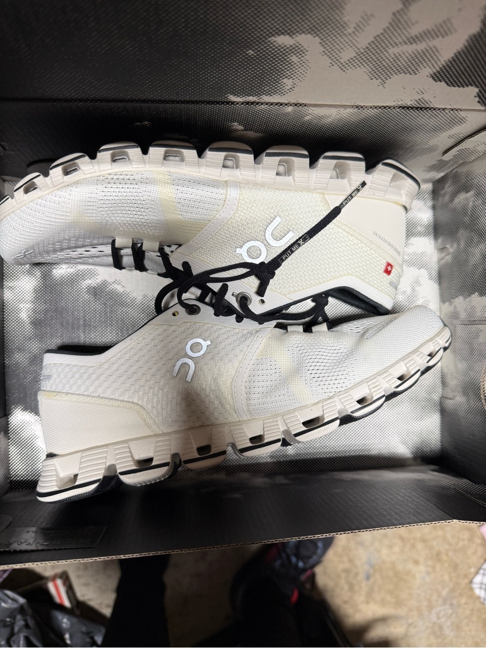 On Running White and Black Cloudflow Sneakers